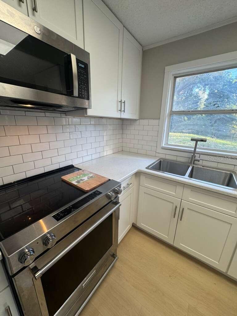 4910 HUPPEL AVE, ORLANDO, FL — photo 22