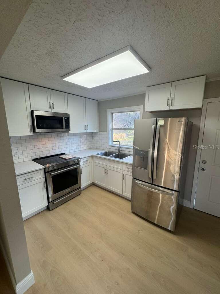 4910 HUPPEL AVE, ORLANDO, FL — photo 25