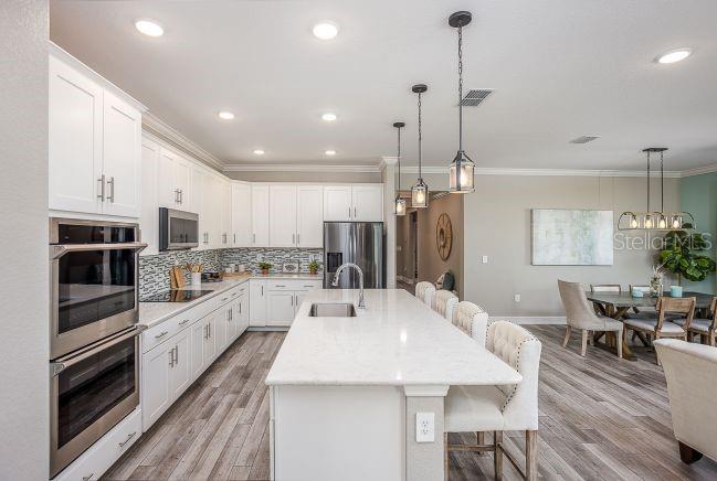 8634 OAKSTONE CIR, LEESBURG, FL — photo 5