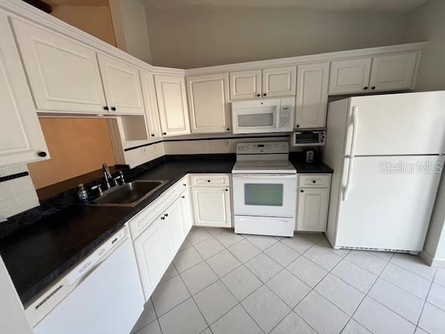 1725 PINE RIDGE WAY E #C, PALM HARBOR, FL — photo 7