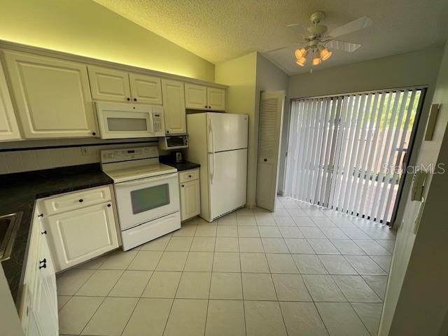 1725 PINE RIDGE WAY E #C, PALM HARBOR, FL — photo 8