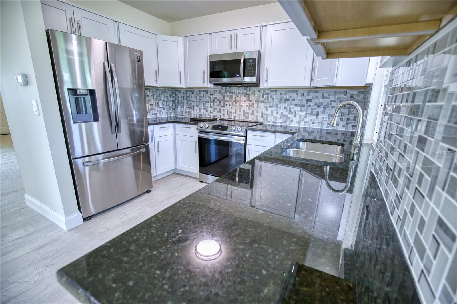 66 OAKLAND HILLS CT, ROTONDA WEST, FL — photo 14