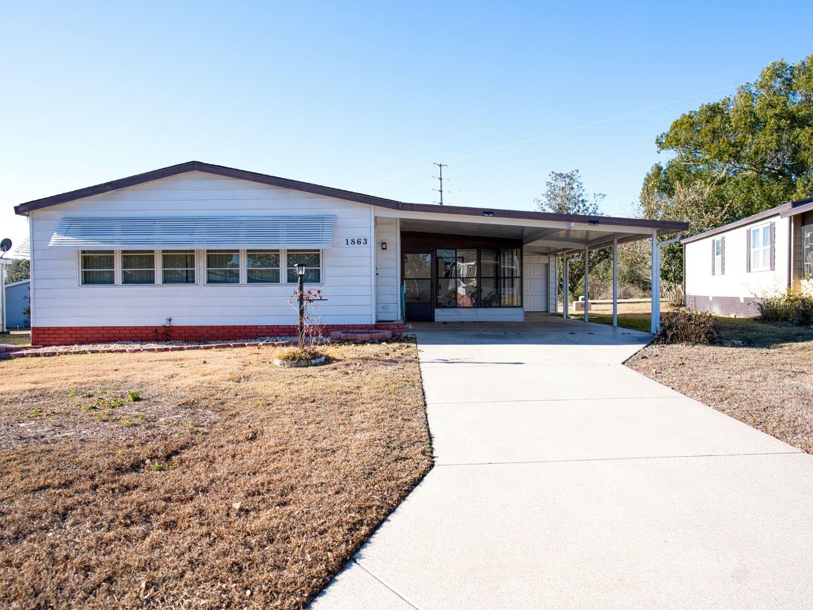 1863 W SCHWARTZ BLVD, LADY LAKE, FL