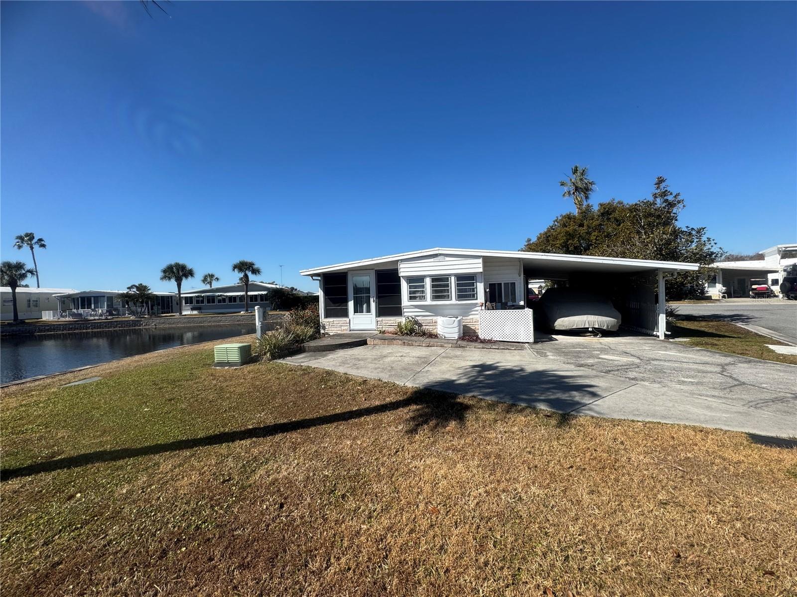 4842 BRITNI WAY #058, ZEPHYRHILLS, FL — photo 2