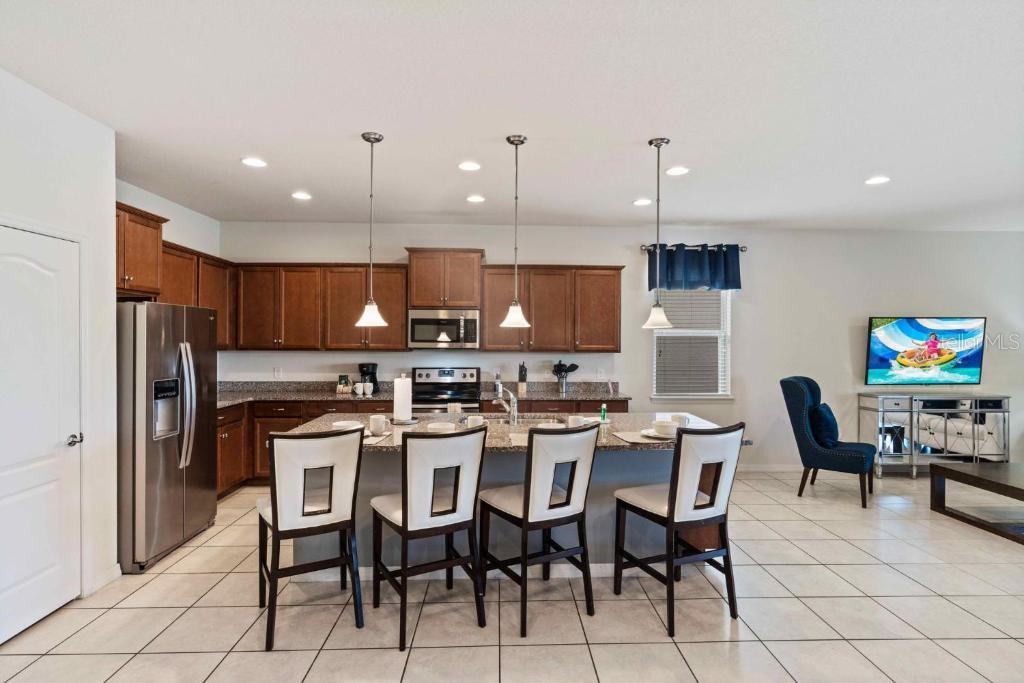 8815 MACAPA DR, KISSIMMEE, FL — photo 6