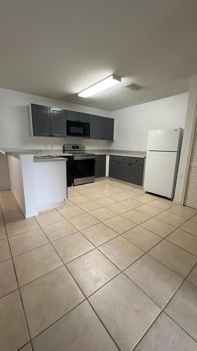 2776 CLUB CORTILE CIR #A, KISSIMMEE, FL — photo 11