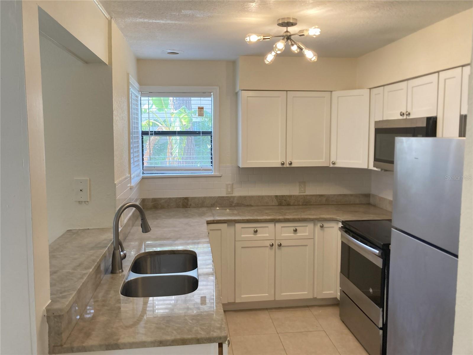 2918 ANTIQUE OAKS CIR #25, WINTER PARK, FL — photo 4