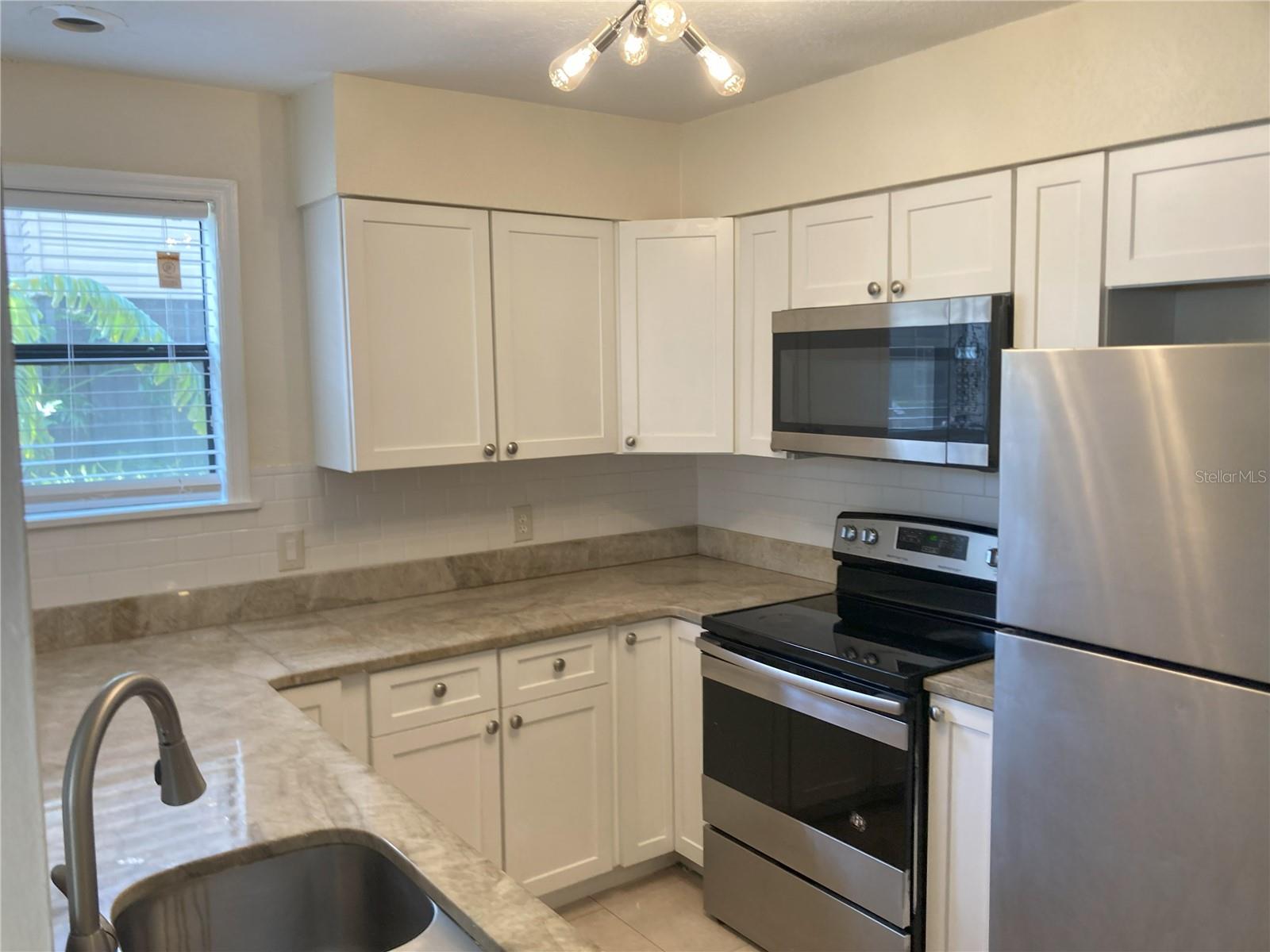 2918 ANTIQUE OAKS CIR #25, WINTER PARK, FL — photo 5