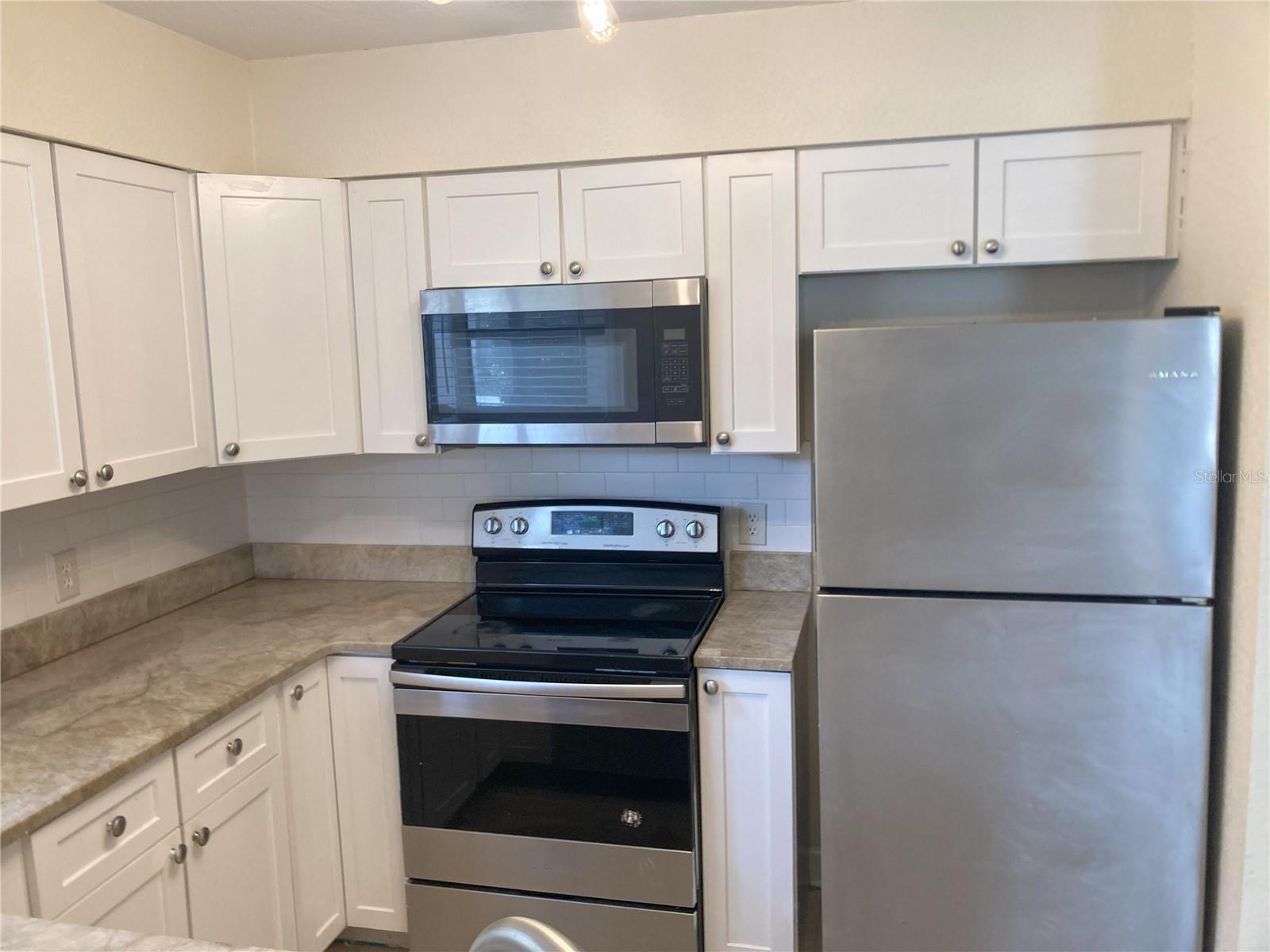 2918 ANTIQUE OAKS CIR #25, WINTER PARK, FL — photo 6