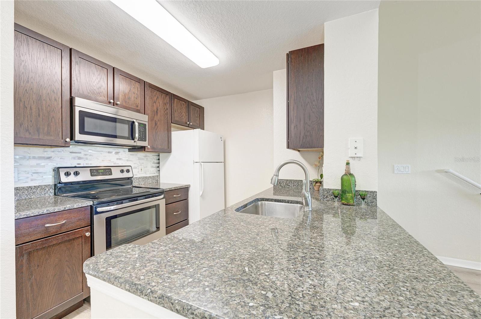 8911 MANOR LOOP #207, LAKEWOOD RANCH, FL — photo 28