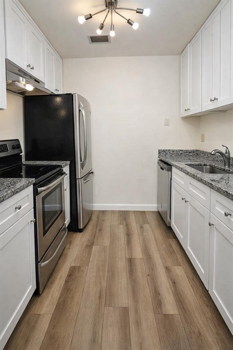 1712 BELLEAIR FOREST DR #A, BELLEAIR, FL — photo 3