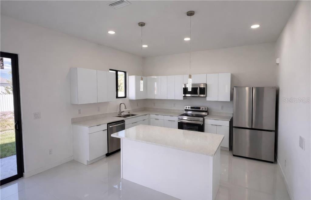 2102 NW 25TH PL, CAPE CORAL, FL — photo 6