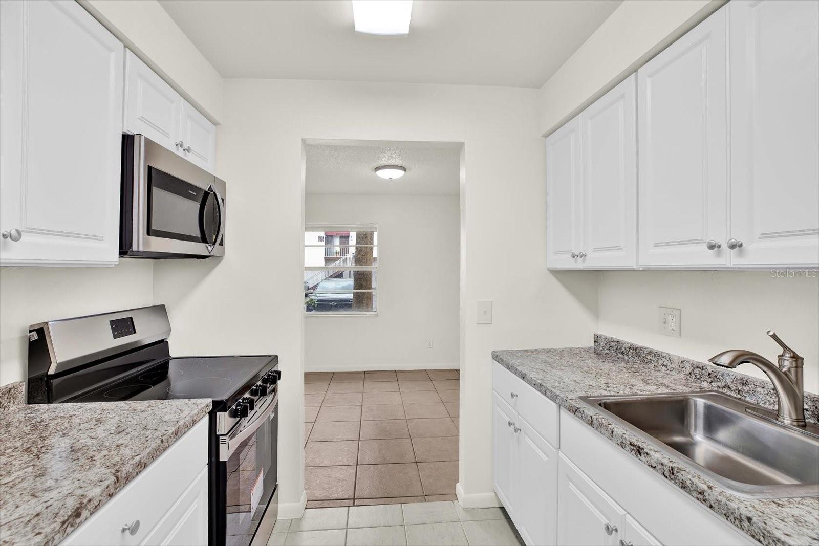 9130 TUDOR DR #M105, TAMPA, FL — photo 6