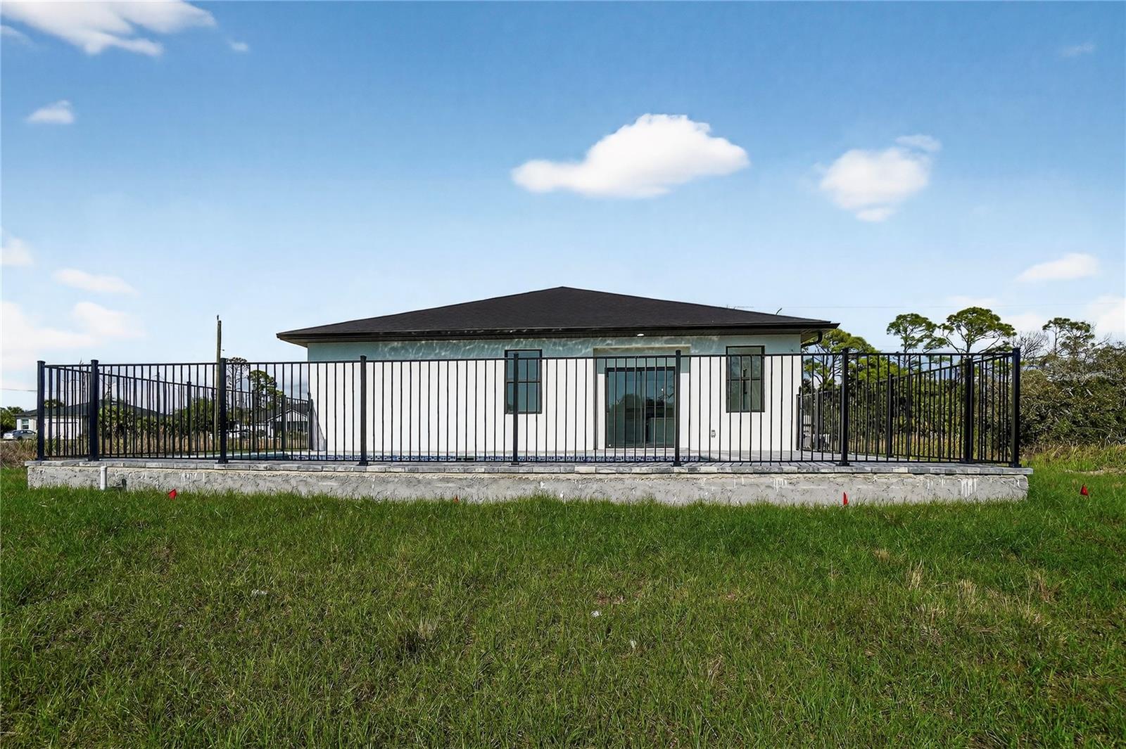 336 SUNSET RD, ROTONDA WEST, FL — photo 56