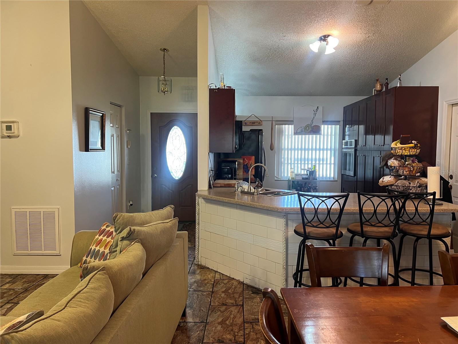 910 LOUVRE CT, KISSIMMEE, FL — photo 7