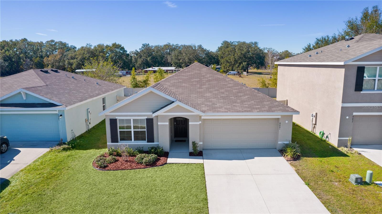 8661 TRIUMPH CIR, WILDWOOD, FL — photo 3