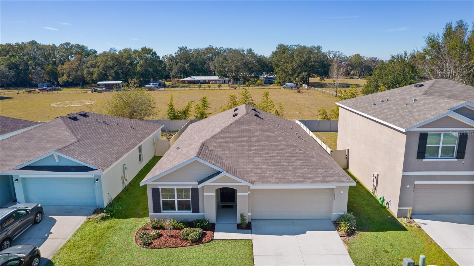 8661 TRIUMPH CIR, WILDWOOD, FL — photo 4