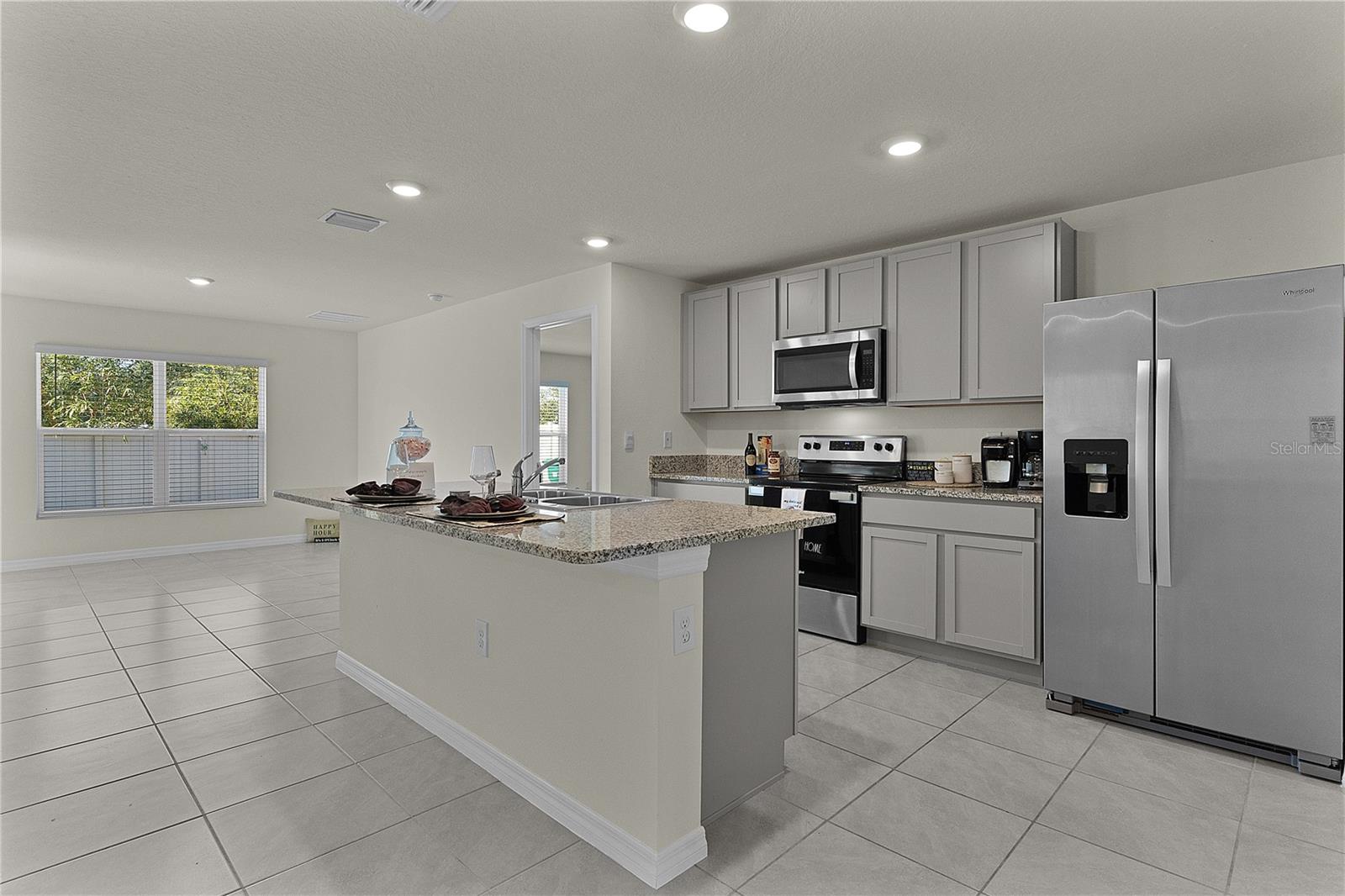 8661 TRIUMPH CIR, WILDWOOD, FL — photo 7