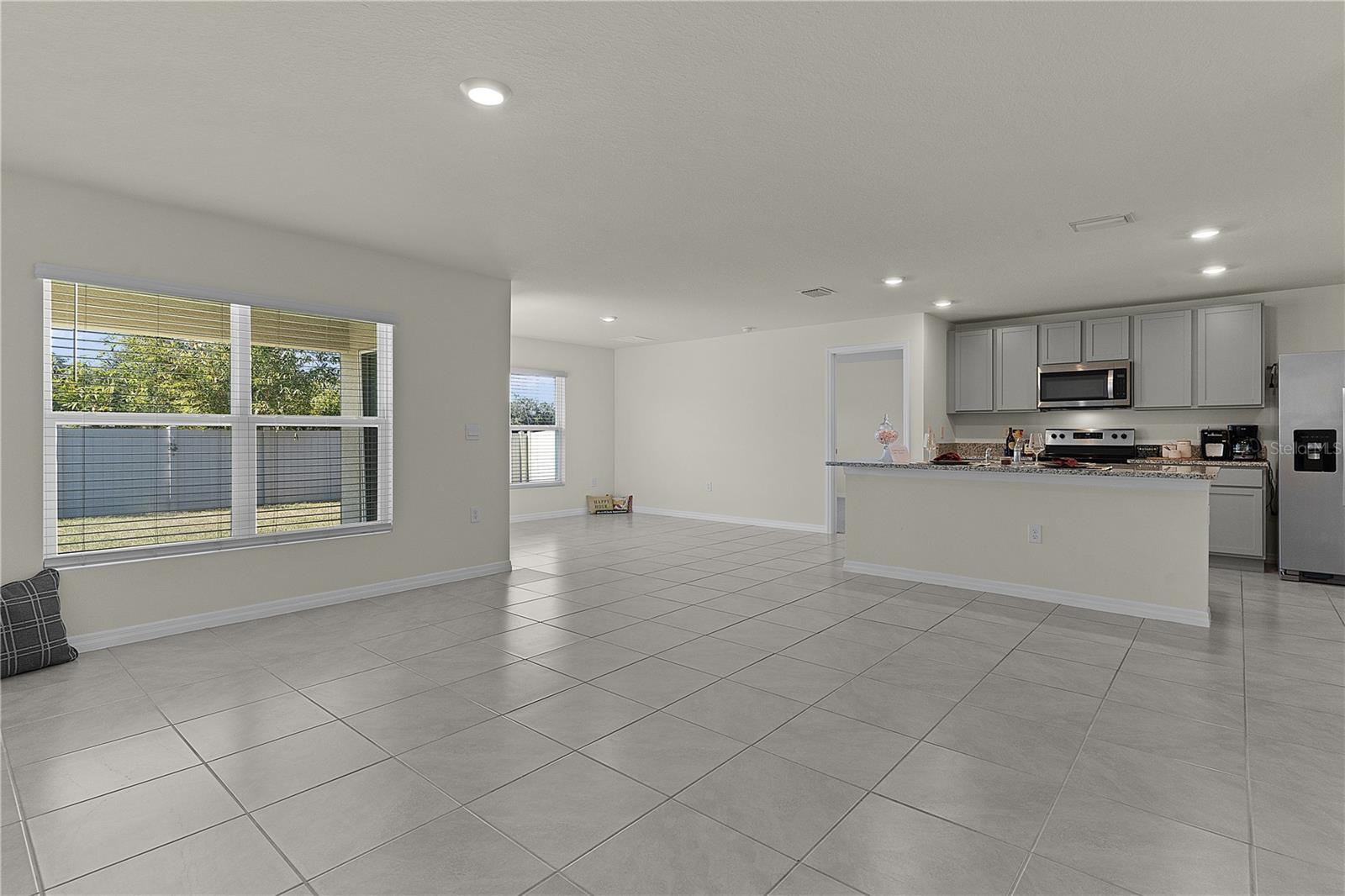 8661 TRIUMPH CIR, WILDWOOD, FL — photo 13