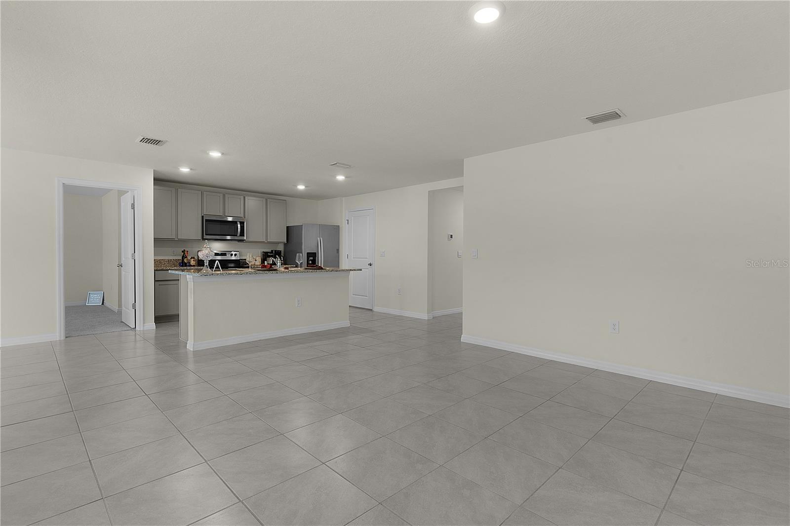 8661 TRIUMPH CIR, WILDWOOD, FL — photo 14