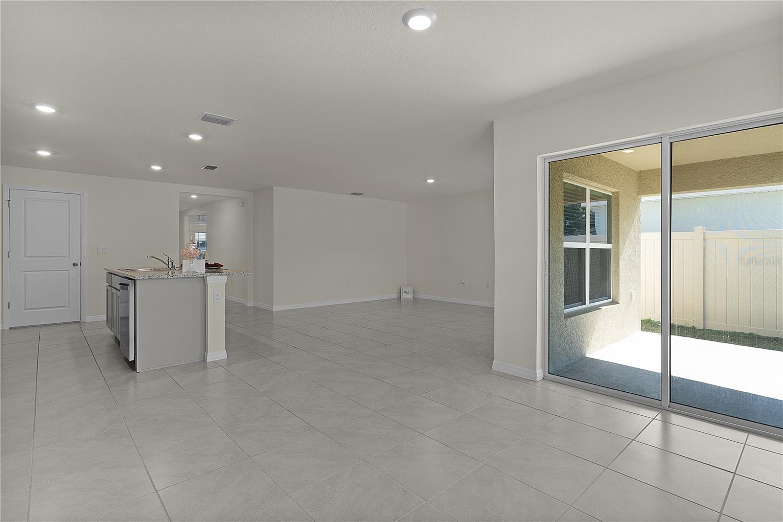 8661 TRIUMPH CIR, WILDWOOD, FL — photo 15