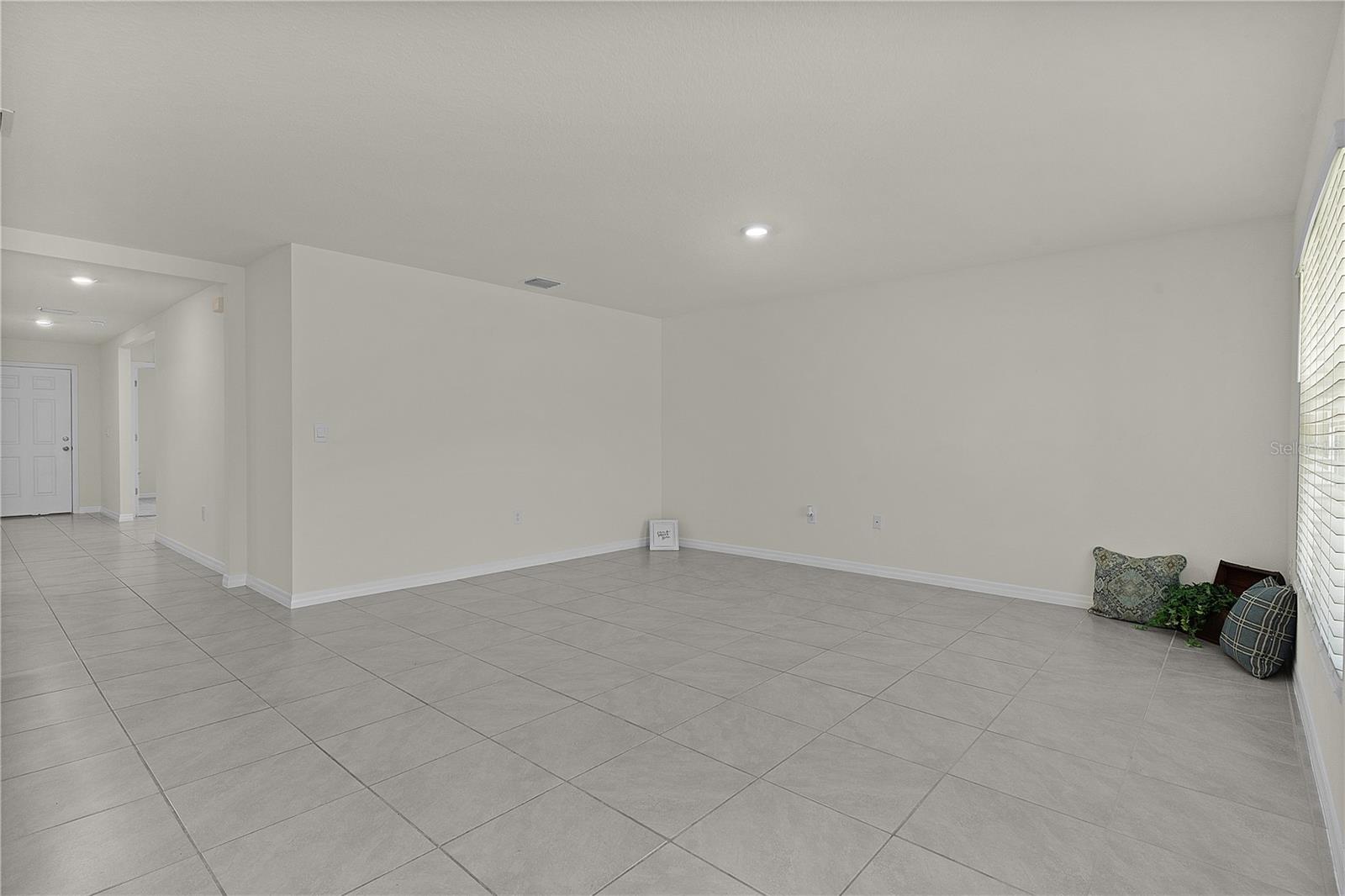 8661 TRIUMPH CIR, WILDWOOD, FL — photo 16