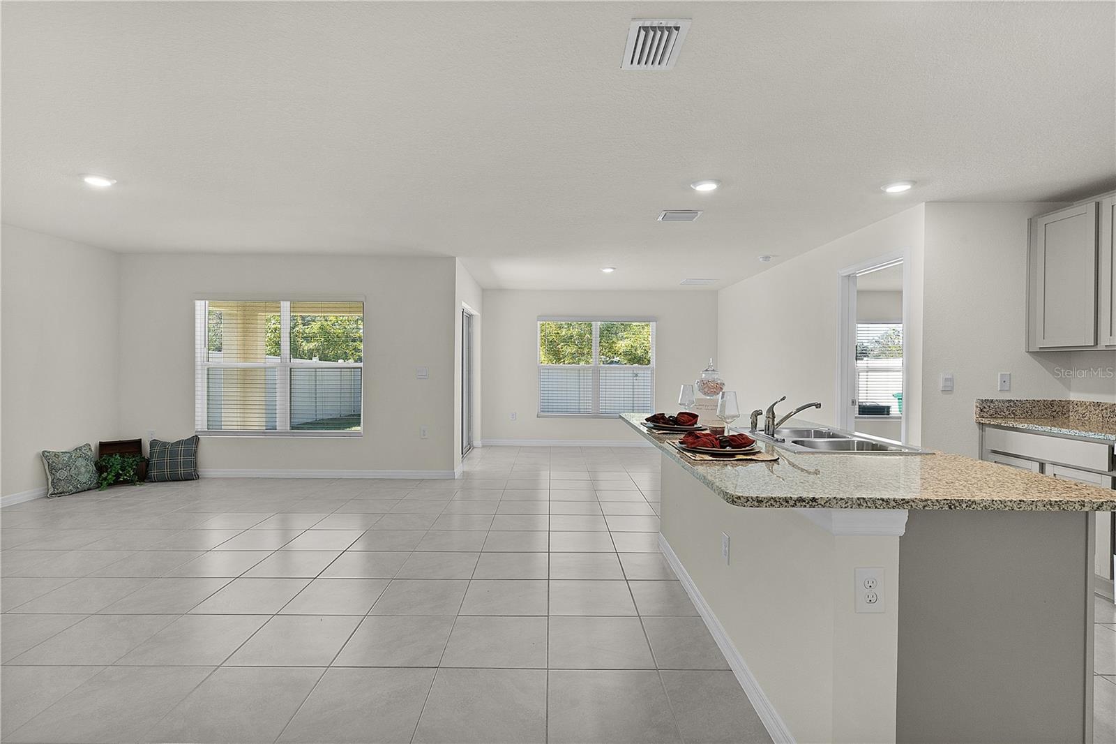 8661 TRIUMPH CIR, WILDWOOD, FL — photo 18