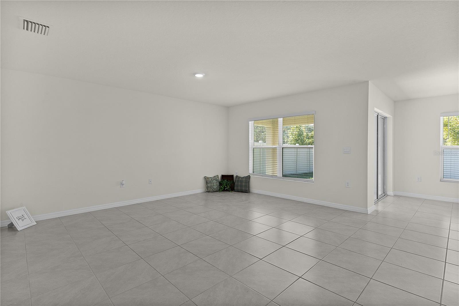8661 TRIUMPH CIR, WILDWOOD, FL — photo 19