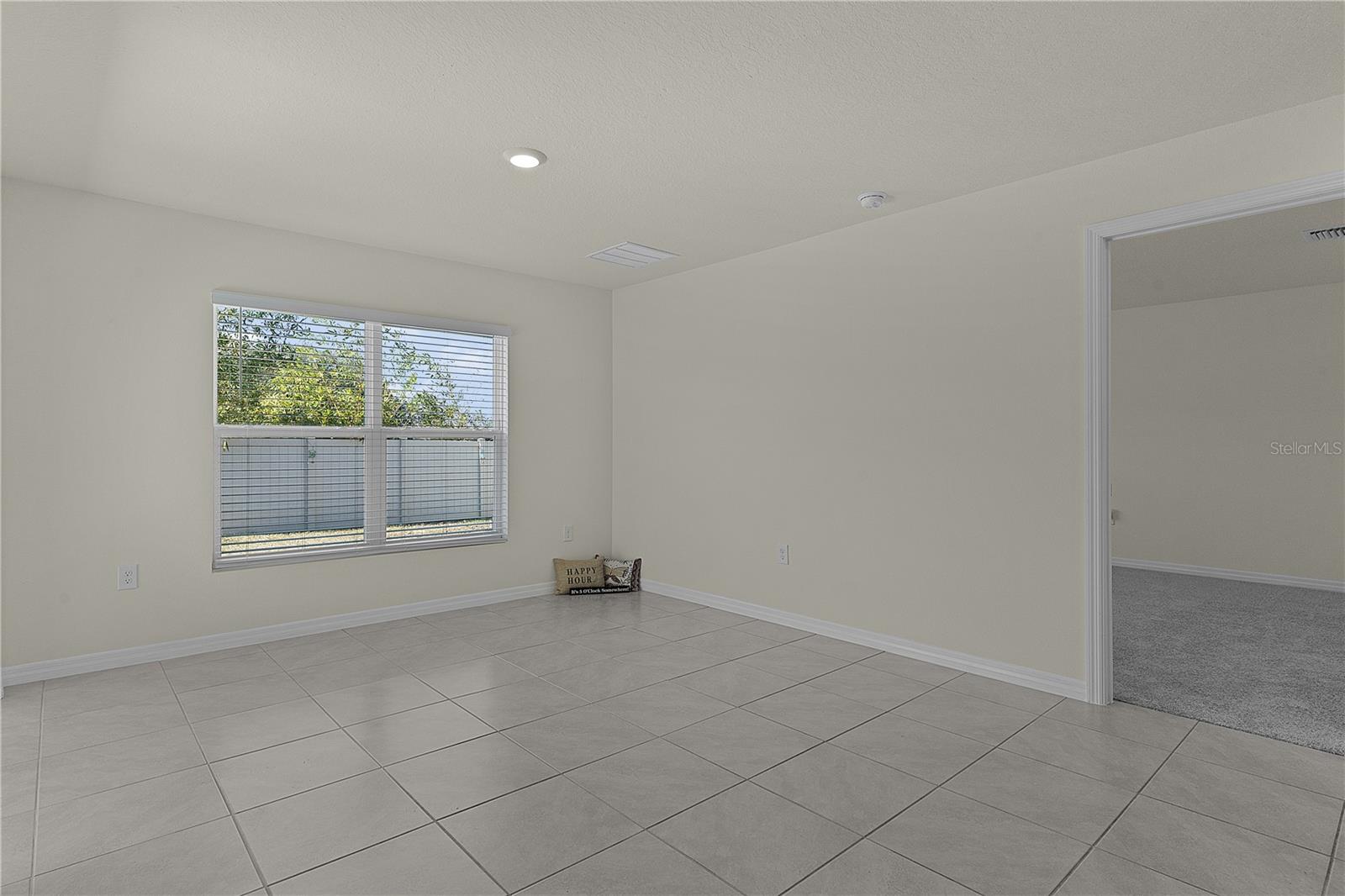 8661 TRIUMPH CIR, WILDWOOD, FL — photo 20