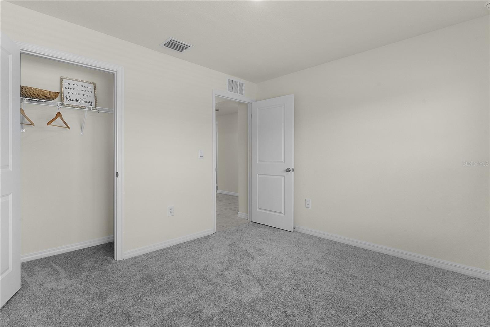 8661 TRIUMPH CIR, WILDWOOD, FL — photo 28