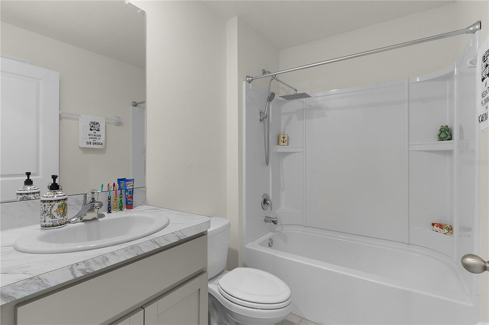 8661 TRIUMPH CIR, WILDWOOD, FL — photo 29