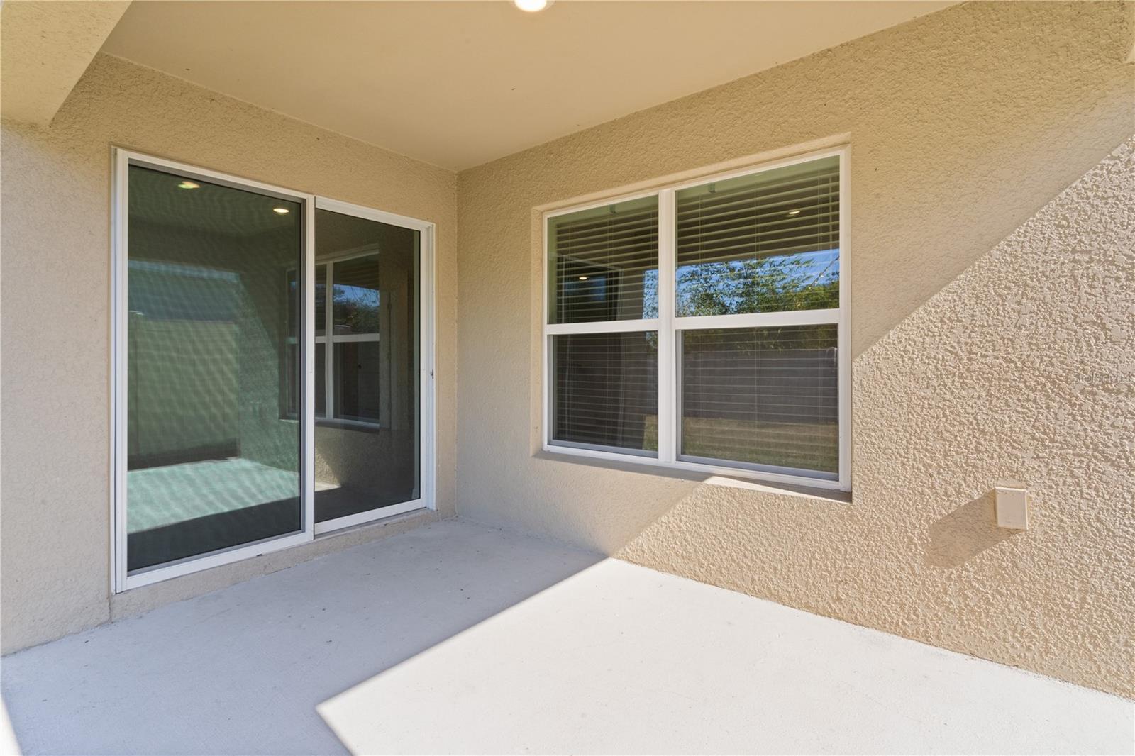 8661 TRIUMPH CIR, WILDWOOD, FL — photo 33