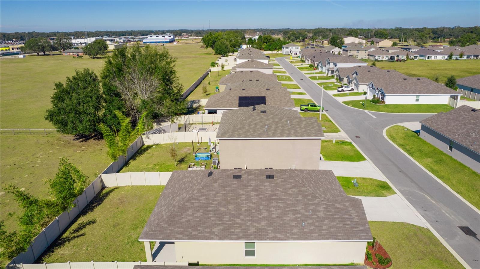 8661 TRIUMPH CIR, WILDWOOD, FL — photo 43