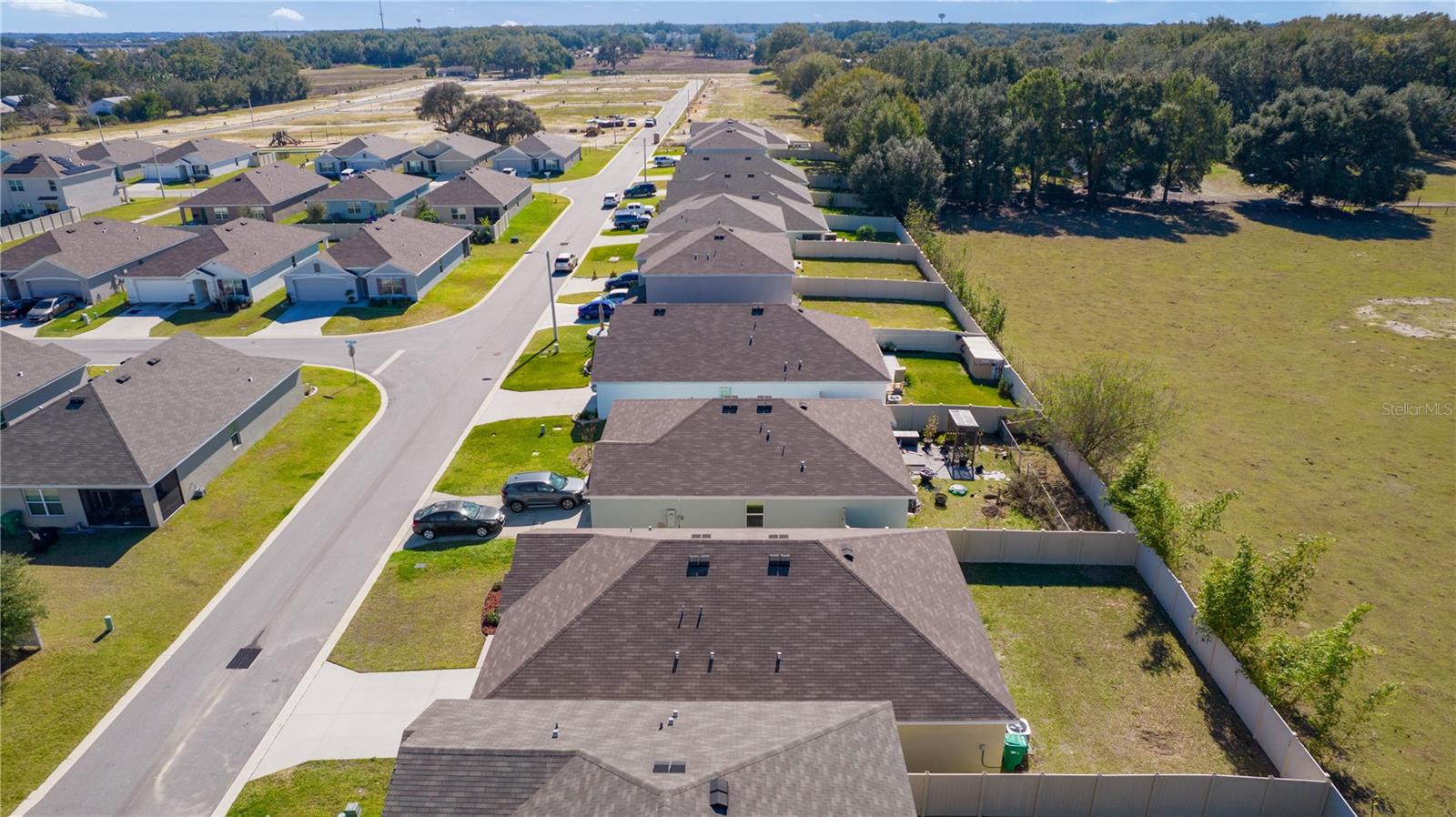8661 TRIUMPH CIR, WILDWOOD, FL — photo 44
