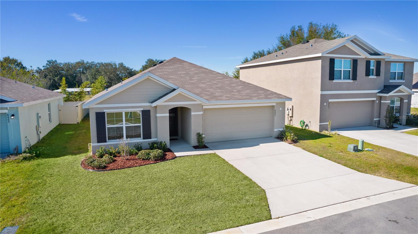 8661 TRIUMPH CIR, WILDWOOD, FL — photo 45