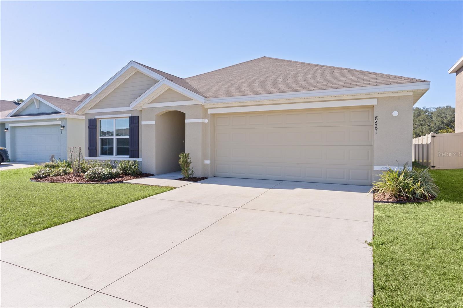 8661 TRIUMPH CIR, WILDWOOD, FL — photo 46