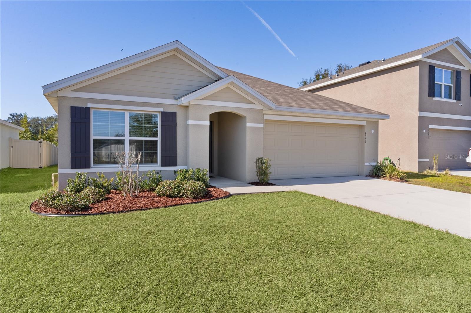 8661 TRIUMPH CIR, WILDWOOD, FL — photo 48