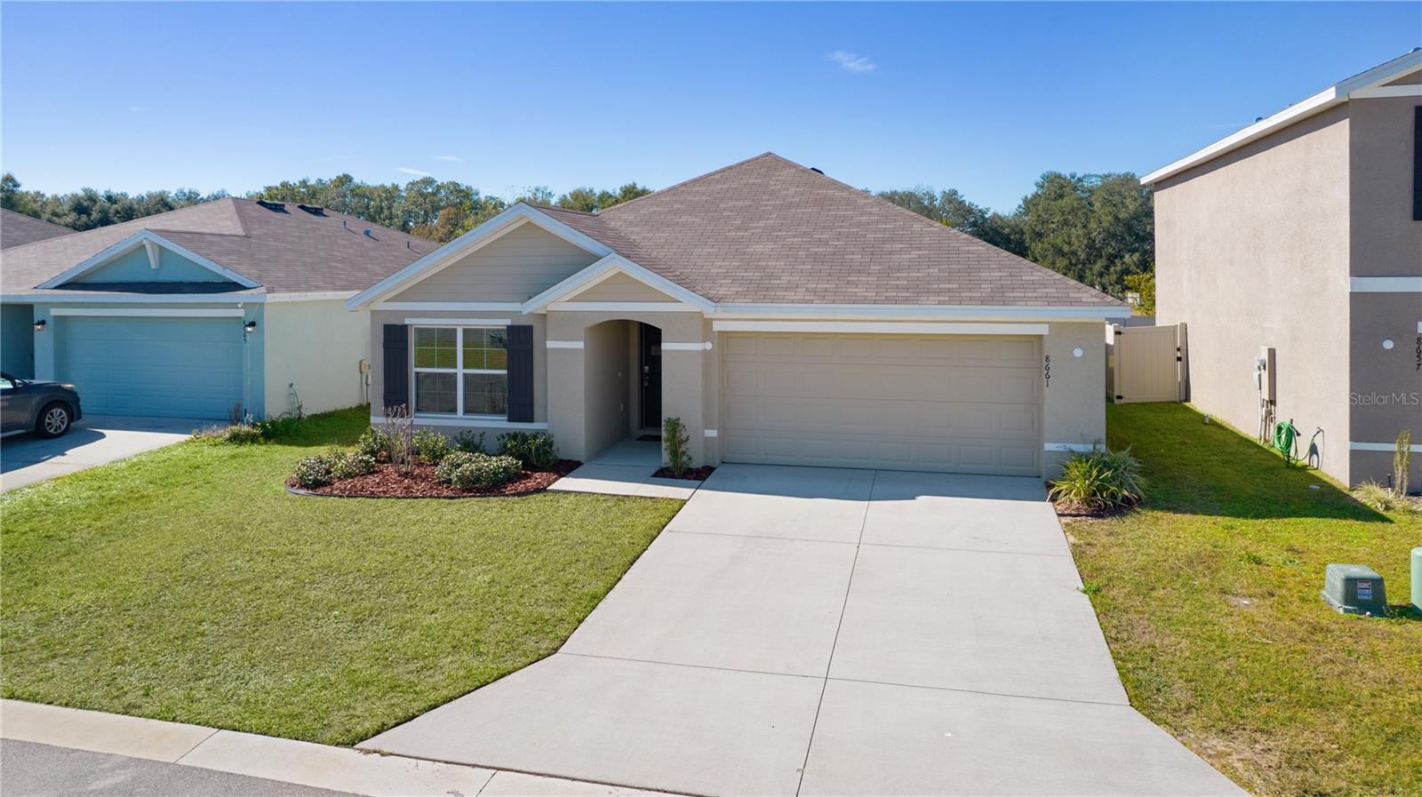 8661 TRIUMPH CIR, WILDWOOD, FL — photo 49