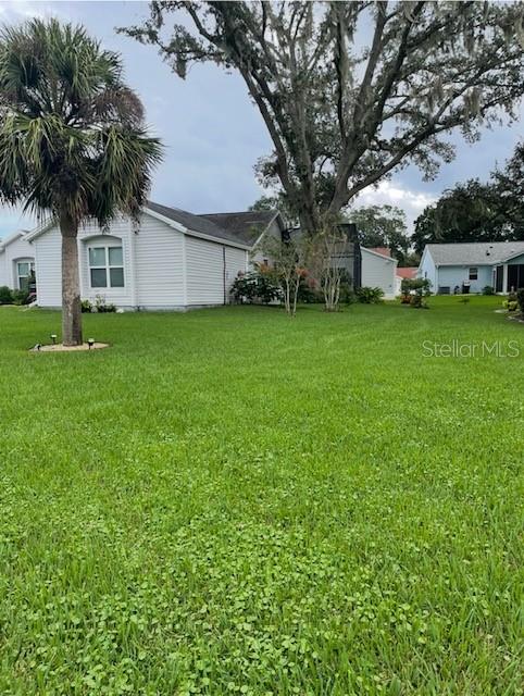 313 GONZALES PL, LADY LAKE, FL — photo 31