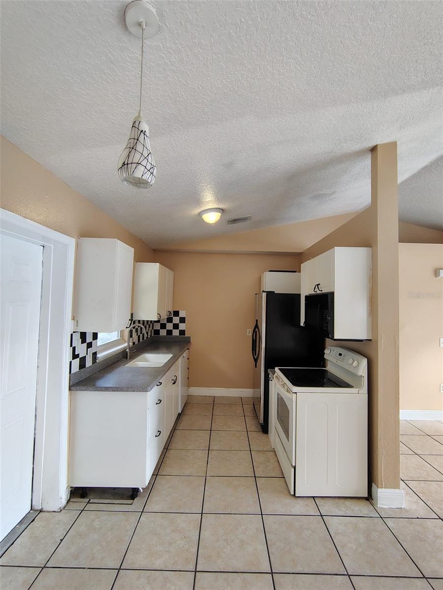 902 N THACKER AVE, KISSIMMEE, FL — photo 13