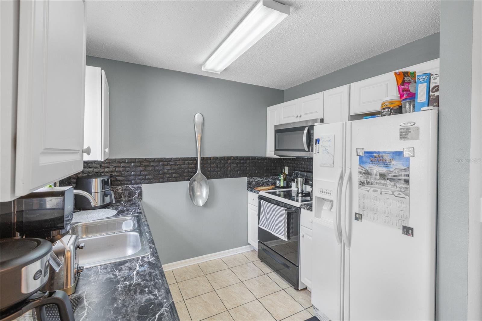 2430 QUAIL RUN BLVD, KISSIMMEE, FL — photo 10