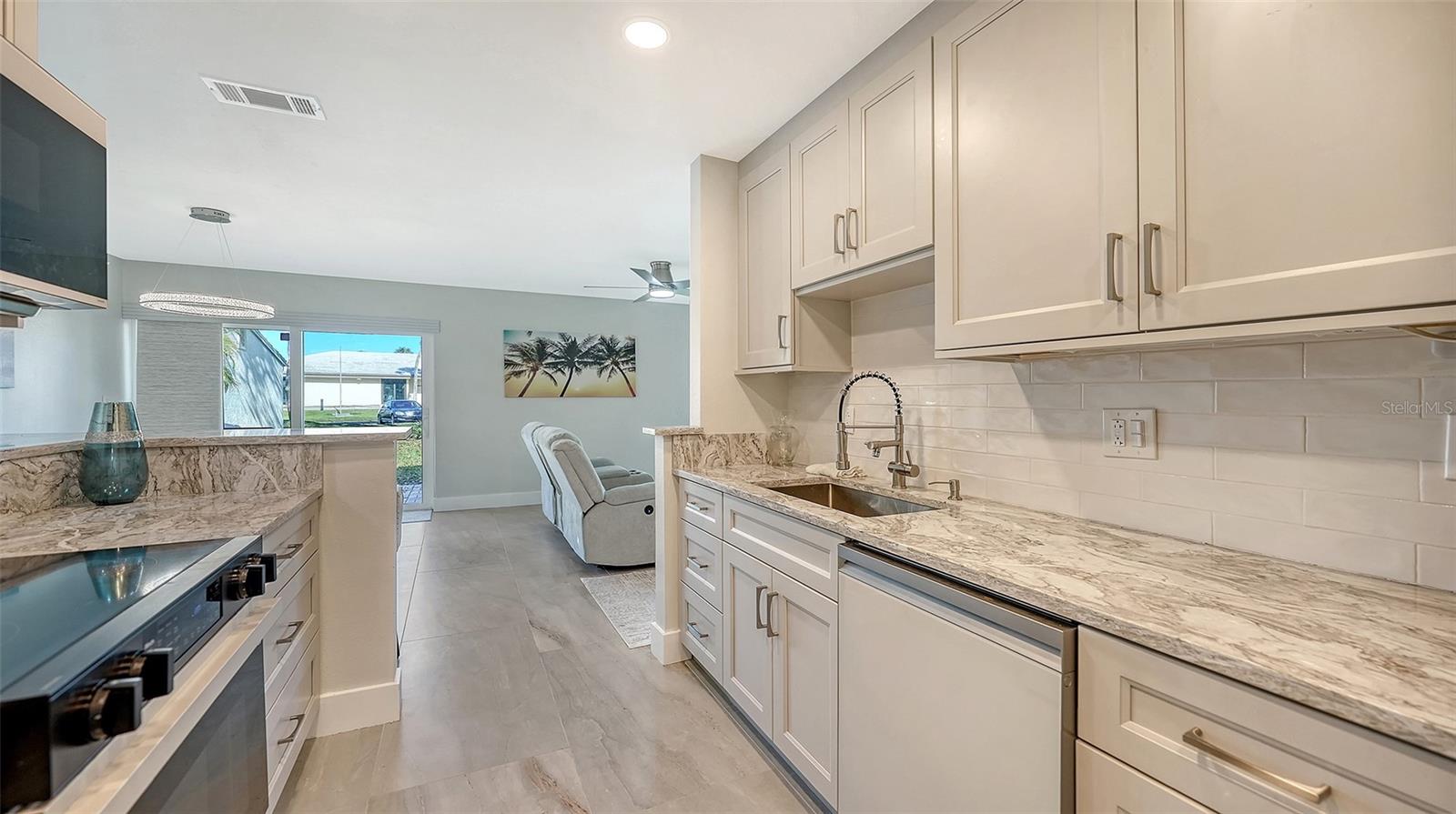 131 WHISPERING SANDS CIR #V33, SARASOTA, FL — photo 20