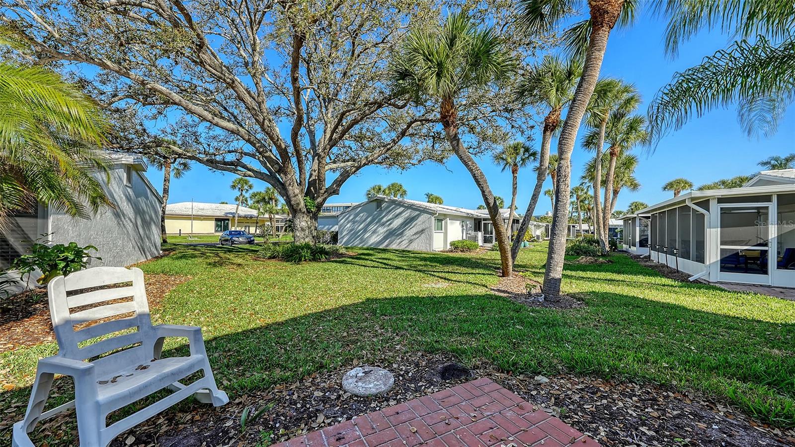 131 WHISPERING SANDS CIR #V33, SARASOTA, FL — photo 34
