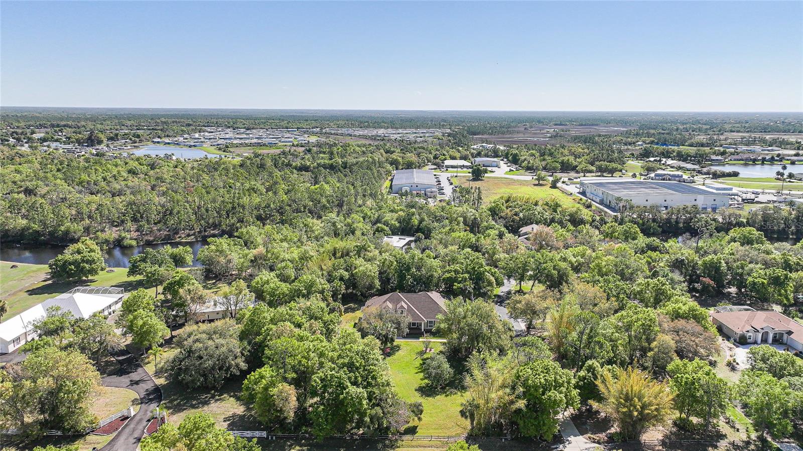 12222 SW AUSTIN AVE, LAKE SUZY, FL — photo 68