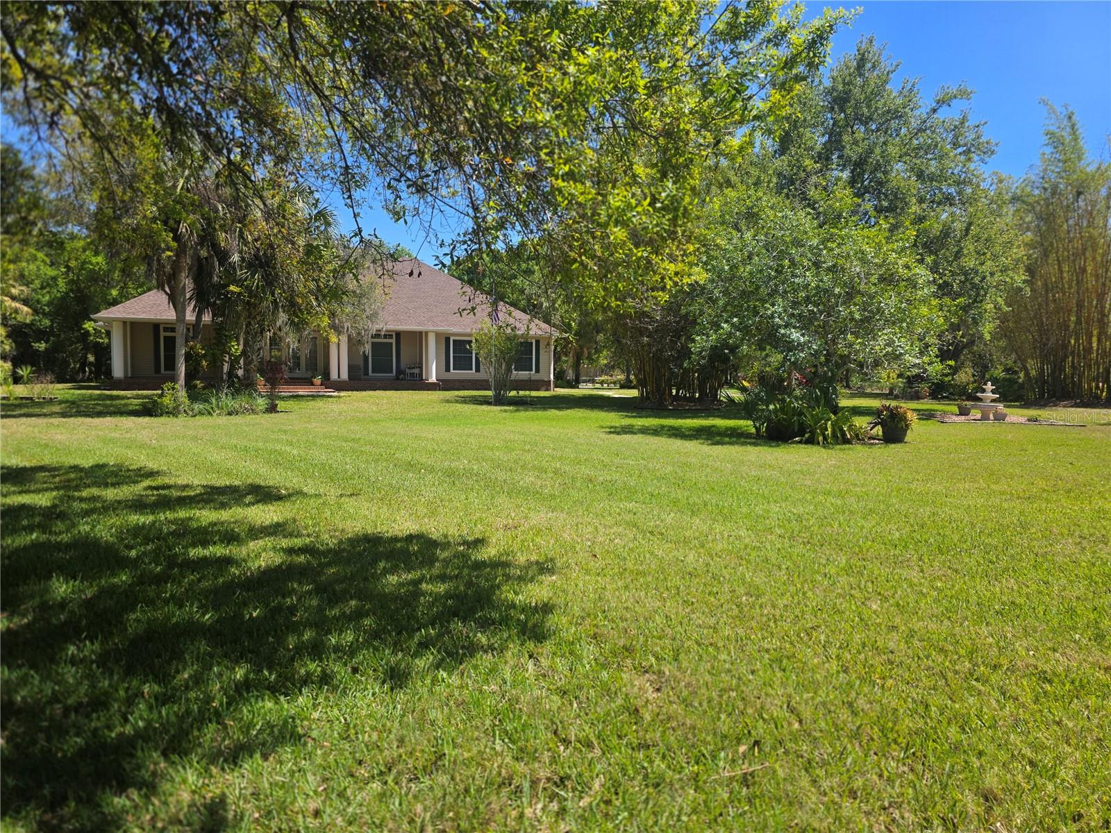 12222 SW AUSTIN AVE, LAKE SUZY, FL — photo 98