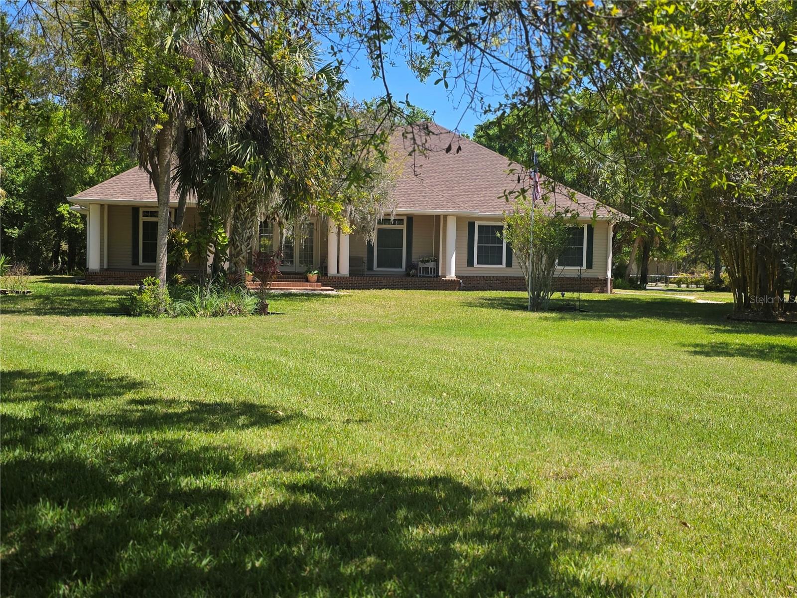 12222 SW AUSTIN AVE, LAKE SUZY, FL — photo 100