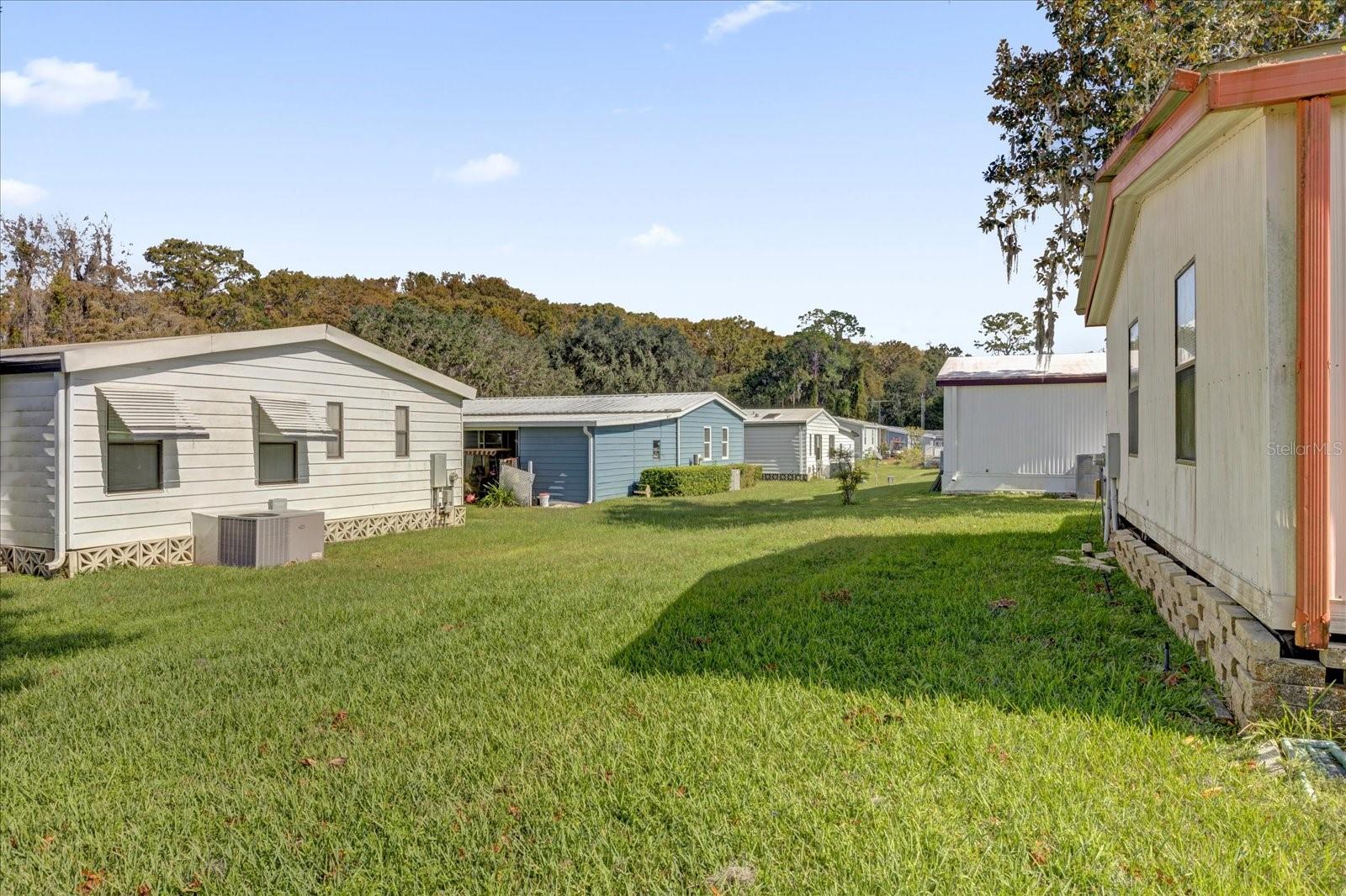 415 S TIMBER TRL, WILDWOOD, FL — photo 27