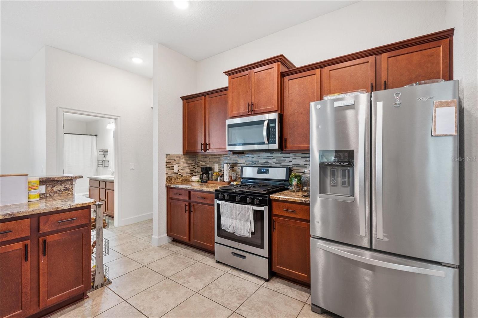 9778 PEPPER TREE PL, WILDWOOD, FL — photo 18