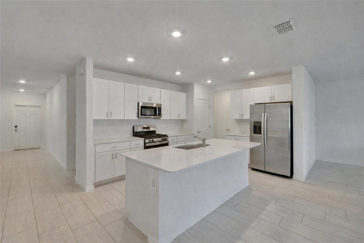 34780 RAINVILLE LOOP, ZEPHYRHILLS, FL — photo 13