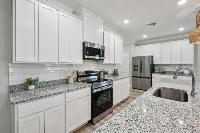 8592 OAKSTONE CIR, LEESBURG, FL — photo 13